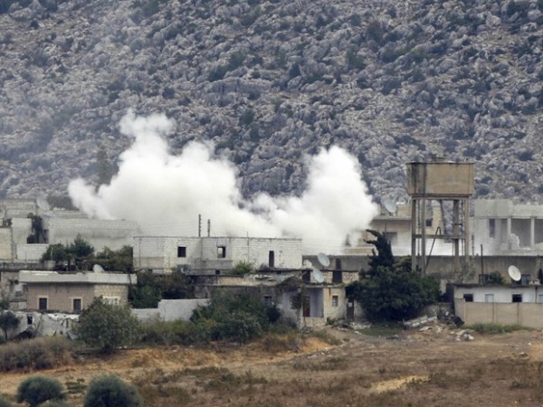 Schools in Turkey’s border town closed as fighting erupts in neighboring Syrian district