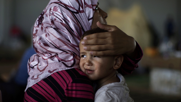 Syria woman and child / Image source: cbc.ca