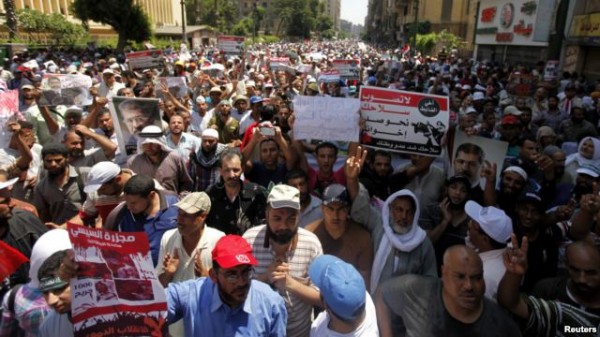 Morsi Loyalists Protest as Egypt's New Government Begins Work