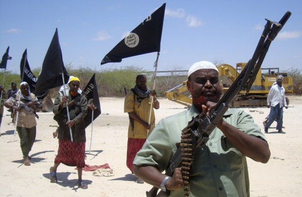 Somali men parade as members of al Shabaab in the capital Mogadishu