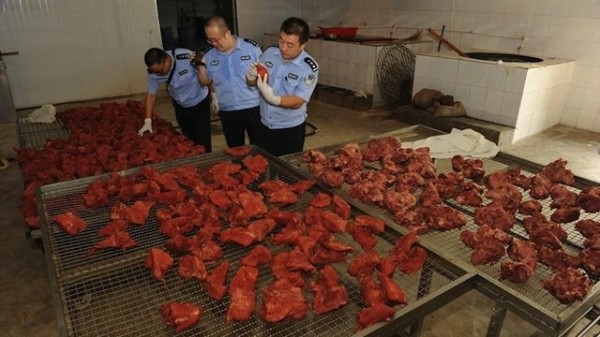 Muslims in China fed pork