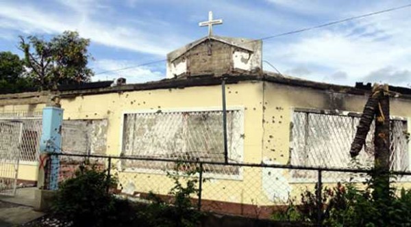 Muslims help rebuild Catholic church in Philippines
