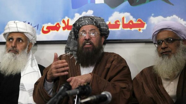 Maulana Sami ul-Haq, one of the Taliban negotiators, speaks during a news conference with his team members Ibrahim Khan and Maulana Abdul Aziz in Islamabad