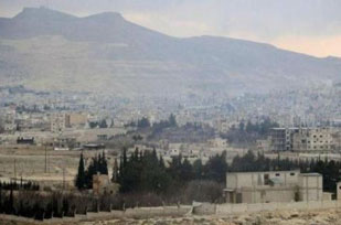 Syrian army captures strategic border town