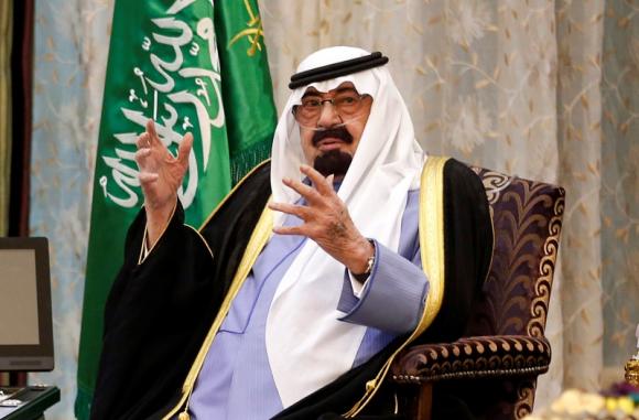 Saudi Arabia's King Abdullah talks during a meeting with U.S. President Barack Obama at Rawdat al-Khraim near Riyadh