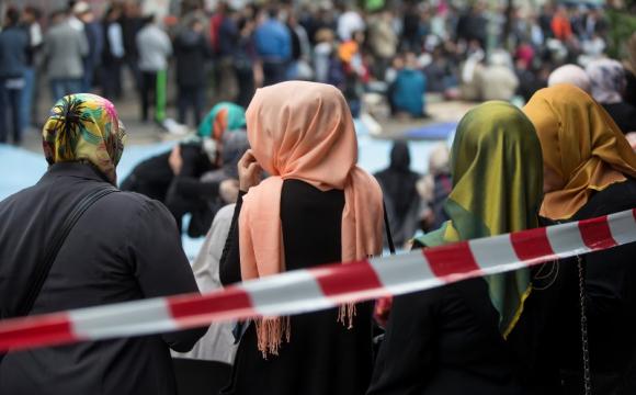 Muslim women wait after Friday prayers on Skalitzer Strasse  in Berlin