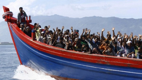 Rohingya Muslim boat people land in Indonesia, thousands more stuck at sea