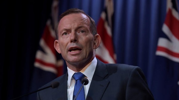 Prime Minister Tony Abbott addresses the media during a national security statement at the AFP headquarters in Canberra, Monday, Feb. 23, 2015.  (AAP Image/Lukas Coch) NO ARCHIVING