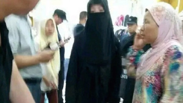 Chinese police arrest women wearing burqas in Henan