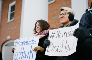 Wheaton College students rally in support of professor on leave