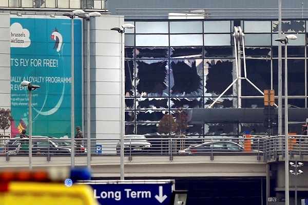 Broken windows seen at the scene of explosions at Zaventem airport near Brussels, Belgium, March 22, 2016. REUTERS/Francois Lenoir