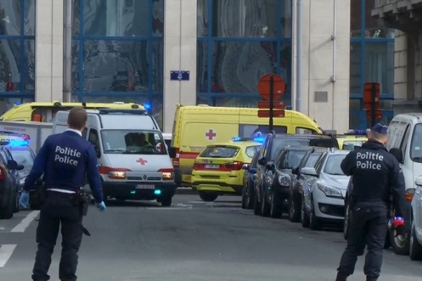 Emergency personnel are seen at the scene of a blast outside a metro station in Brussels, in this still image taken from video on March 22, 2016. REUTERS/Reuters TV