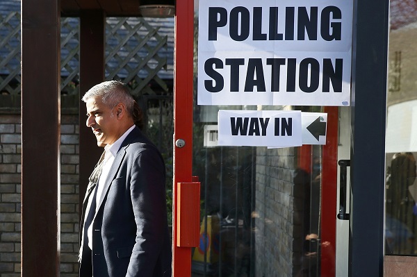 Sadiq Khan, Britain's Labour Party candidate for Mayor of London and his wife Saadiya leave after casting their votes for the London mayoral elections at a polling station in south London Britain May 5, 2016. REUTERS/Stefan Wermuth