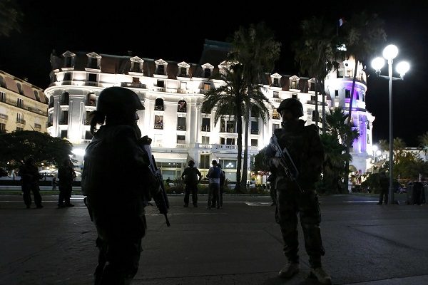 French soldiers secure the street after at least 30 people were killed in Nice, France, when a truck ran into a crowd celebrating the Bastille Day national holiday July 14, 2016. REUTERS/Eric Gaillard