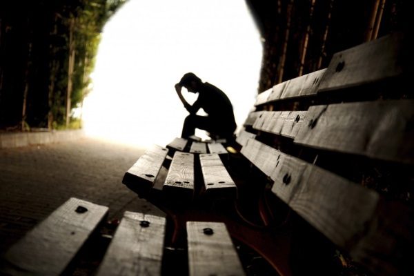 depressed-man-on-bench