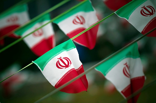 Iran's national flags are seen on a square in Tehran, Iran February 10, 2012. REUTERS/Morteza Nikoubazl/File Photo